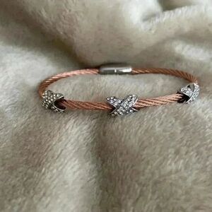Designer bracelet, rose gold color with cubics
